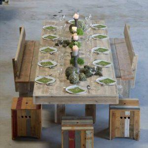 recycled pallet dining table with benches and stools