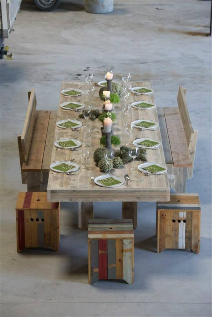 recycled pallet dining table with benches and stools