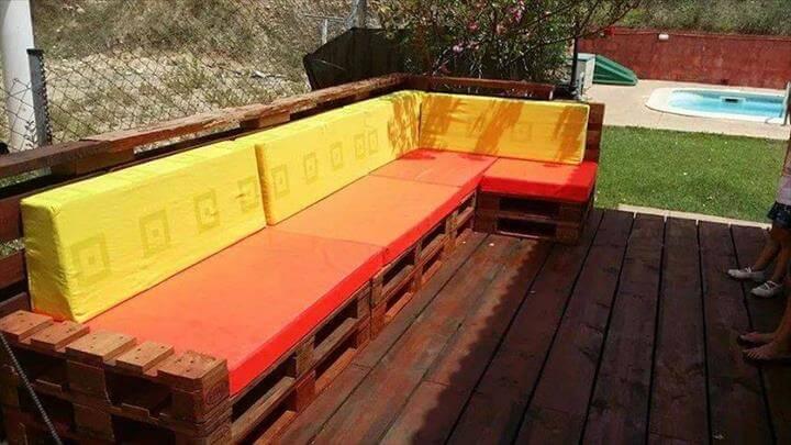 x-large pallet L-shaped patio sofa with orange cushion