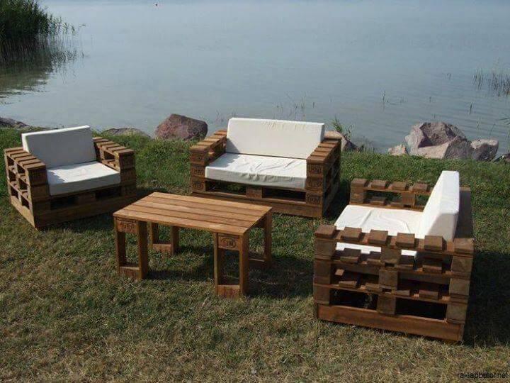 sturdy pallet sofa and chairs with white foam cushions