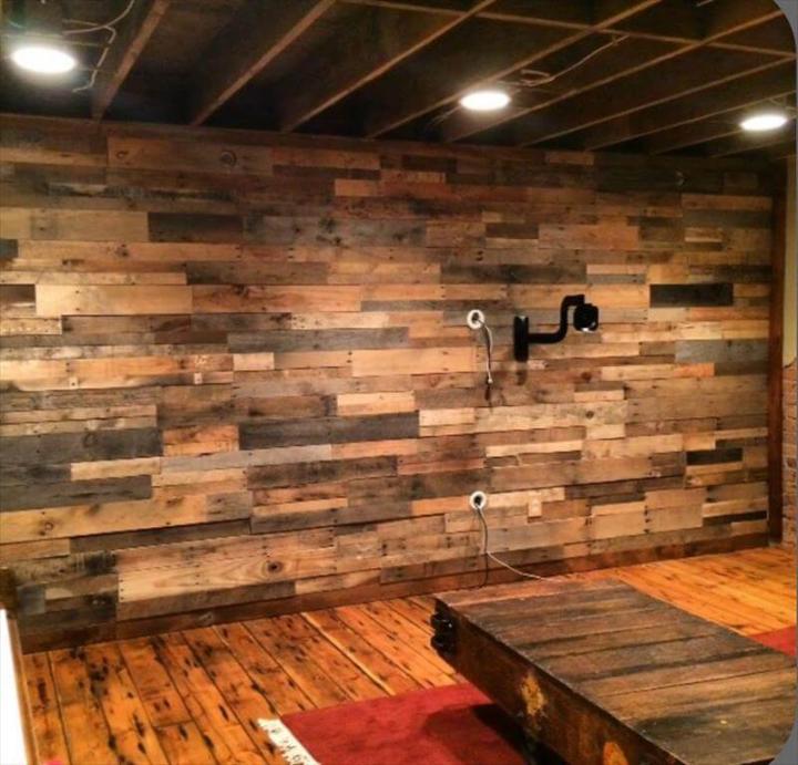 pallet wood paneled wall with scones lights