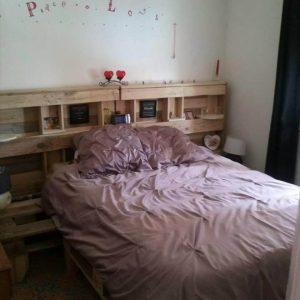 repurposed pallet bed with storage-friendly headboard