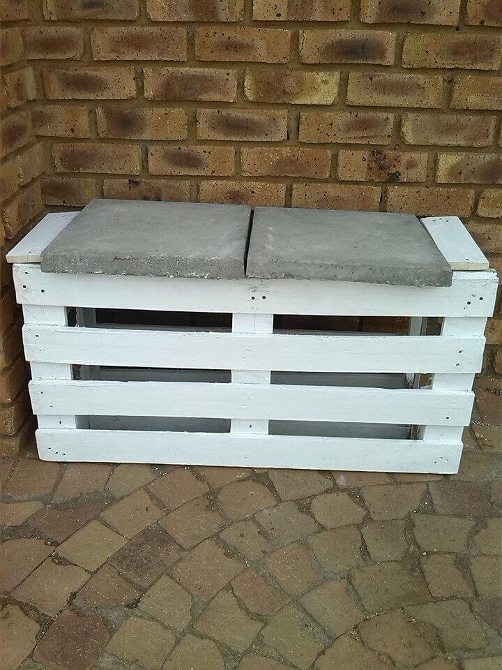 White painted pallet bench with concrete tile berth section