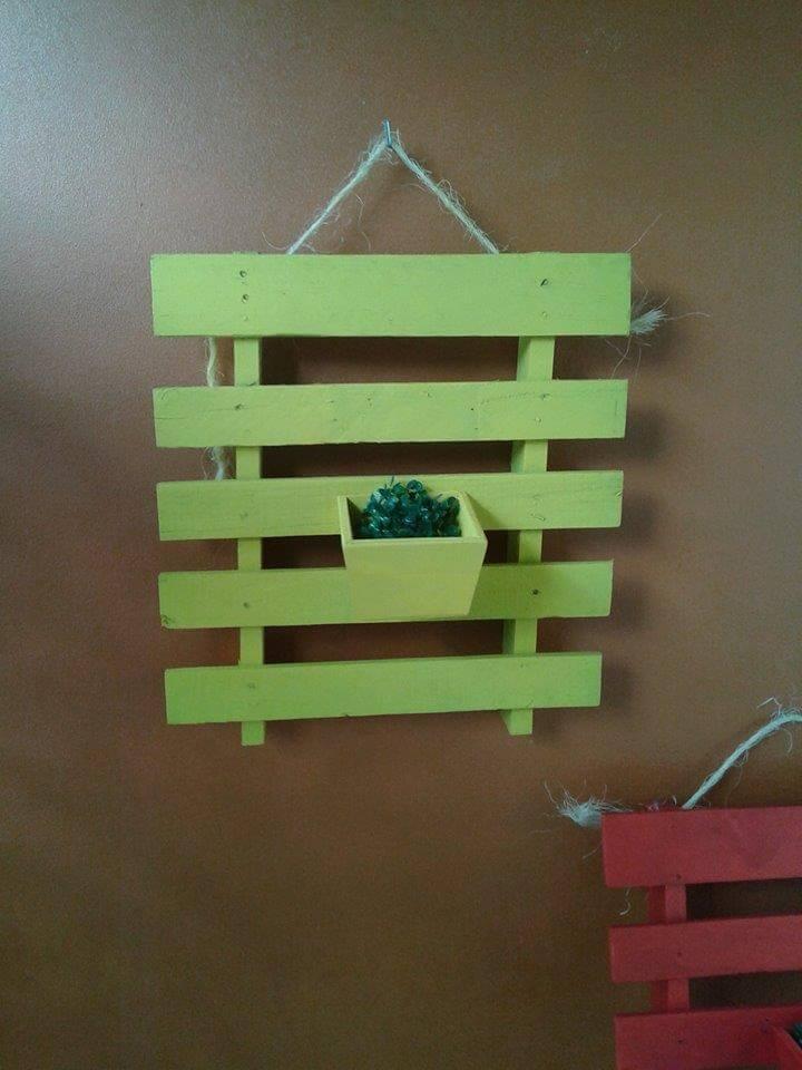 green painted pallet planter