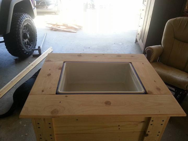 fitting of cooler inside the wooden holding