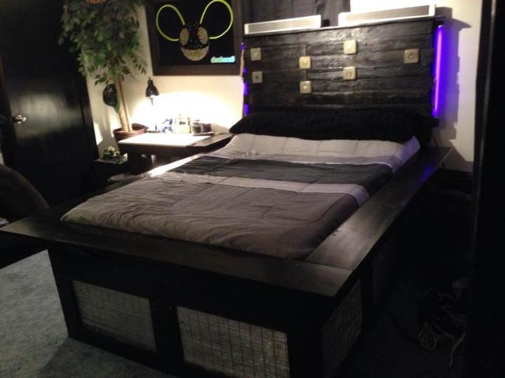 Reclaimed pallet platform bed with headboard