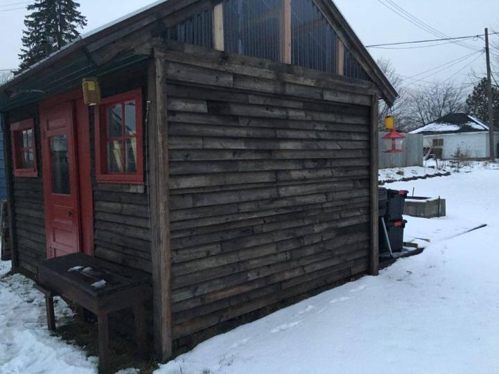 handcrafted wooden pallet shed