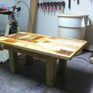 upcycled wooden pallet coffee table with thicker wooden legs