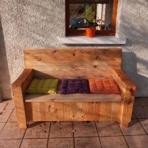 low-cost wooden pallet sofa with storage