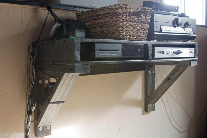 shelf for electronics made of pallets
