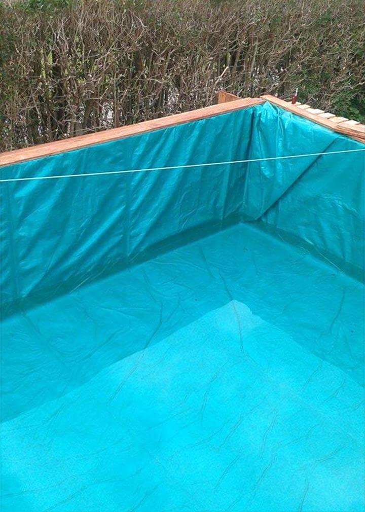 custom wooden outdoor swimming pool made of 40 pallets