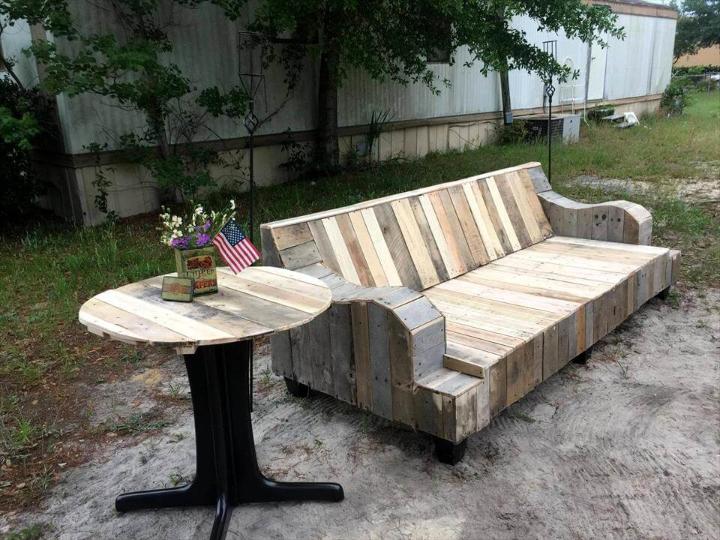 refurbished pallet old couch and pedestal metal table frame