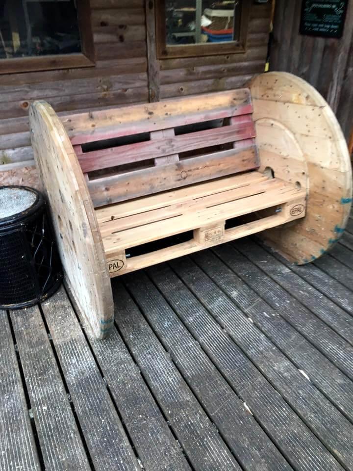 reclaimed pallet and old spool wheel bench