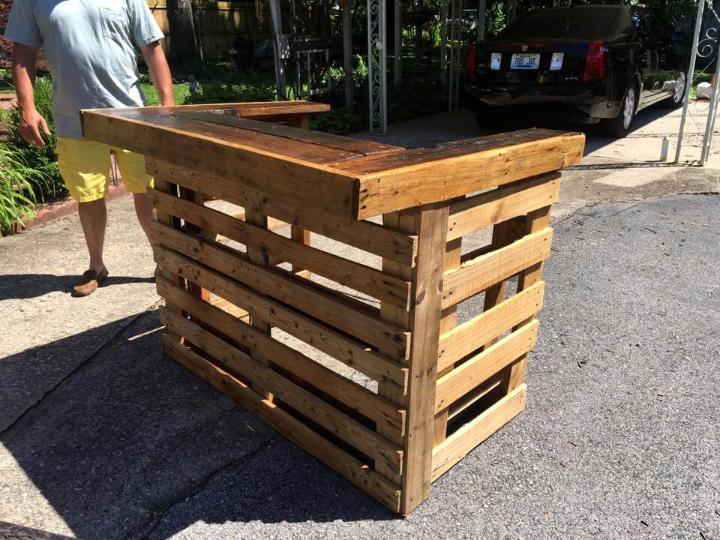 sturdy wooden bar made of pallets