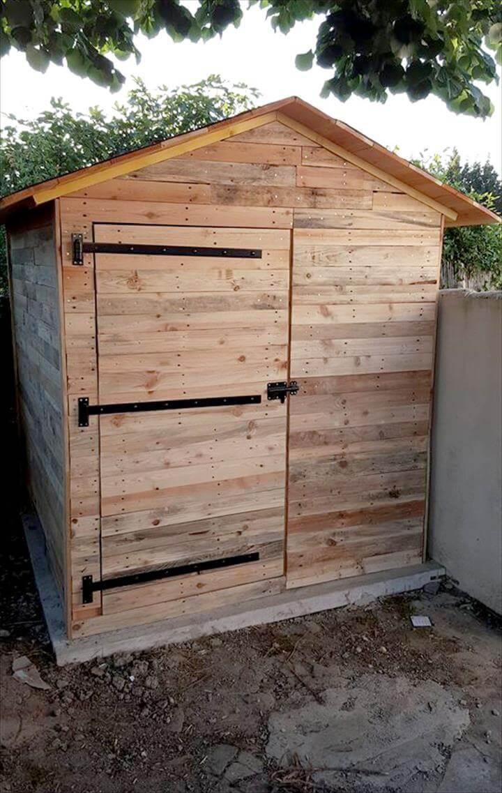 handcrafted wooden pallet outdoor cabin or shed