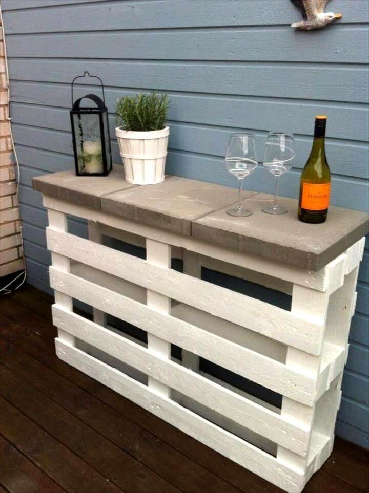 white painted pallet bar with concrete counter