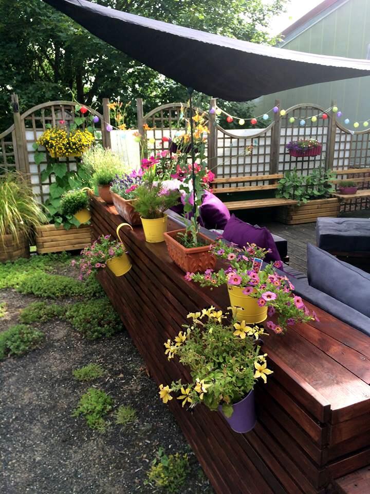 amazing pallet lounge with planters boxes installed in the backrest