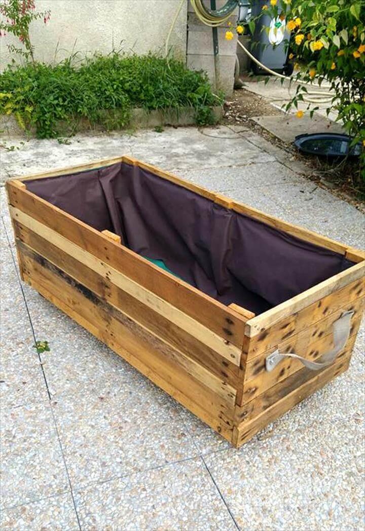 large wooden pallet planter with inside covered with waterproof felt