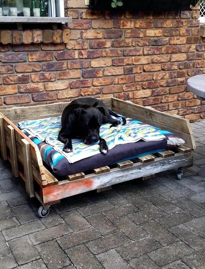 rustic wooden pallet dog bed on wheels