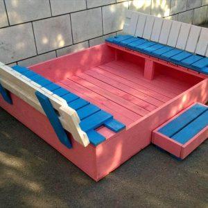 sturdy wooden pallet sandbox with folding back seats