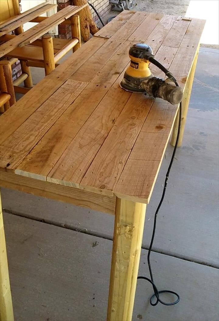 sanding the table surfaces