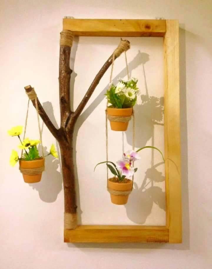 custom wooden pallet and old tree branches hanging pot wall art