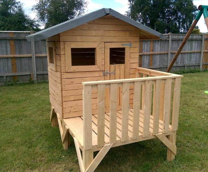 small playhouse made out of pallets for kids