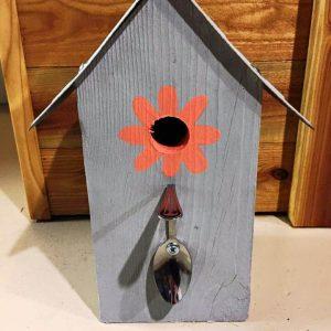 recycled pallet and old number plate birdhouse
