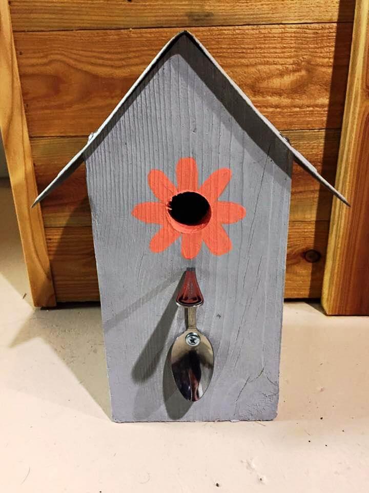 recycled pallet and old number plate birdhouse