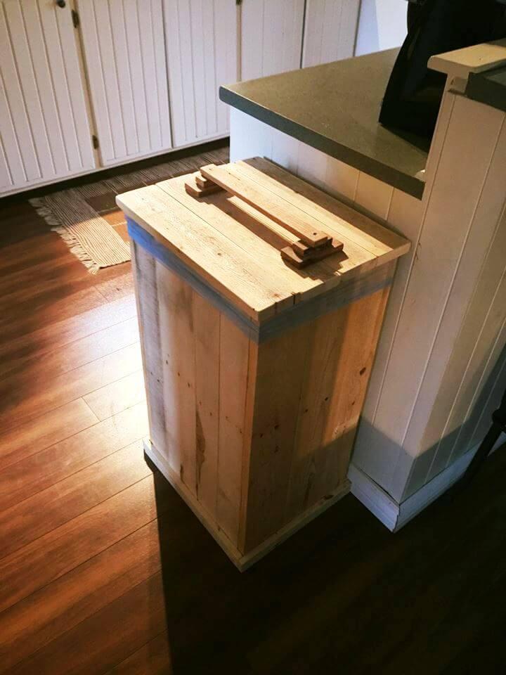 wooden garbage bin made out of pallets