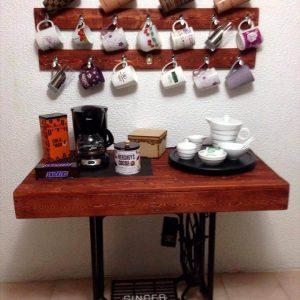 reclaimed wooden pallet and old sewing machine base coffee station