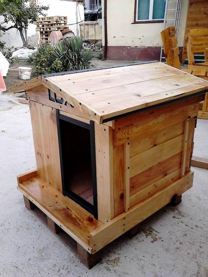 low-cost wooden pallet dog house with chevron roof