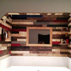 reclaimed pallet wall paneling project around the jacuzzi bath tub