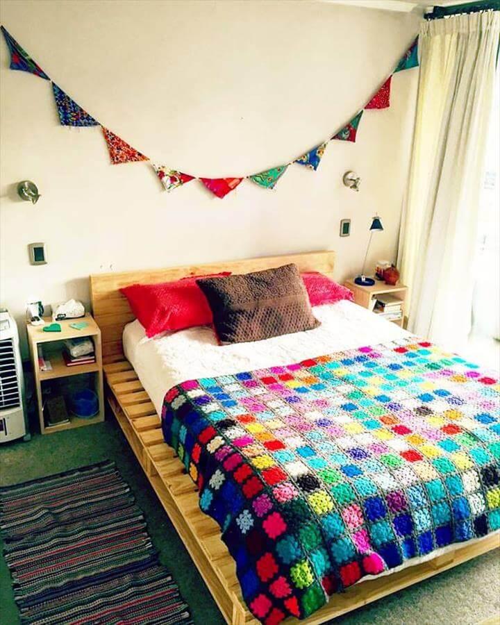self-installed pallet bed with headboard