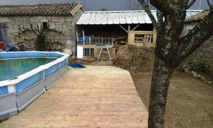 diy wooden floor or walkway around the swimming pool