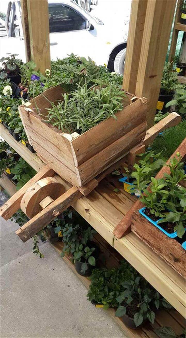 reclaimed pallet wheelbarrow planter