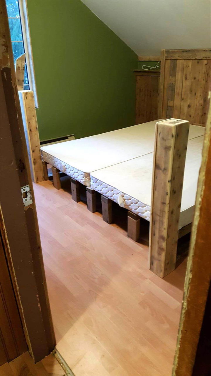 repurposed wooden pallet bed