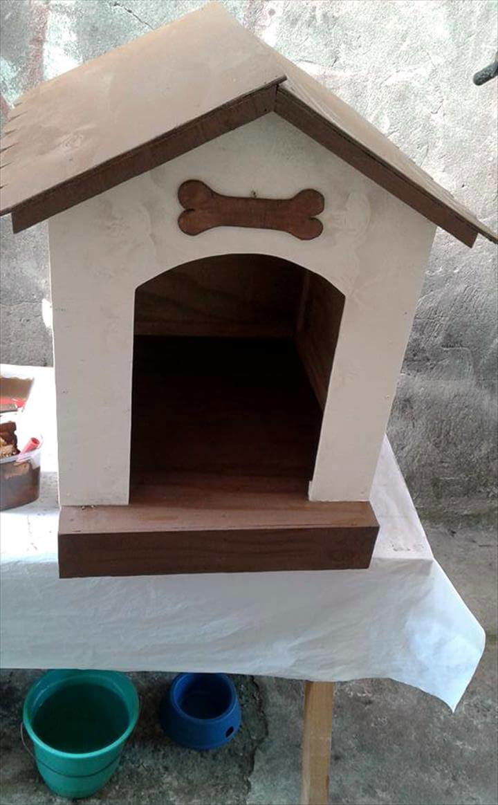 recycled pallet dog house with dog bone sign