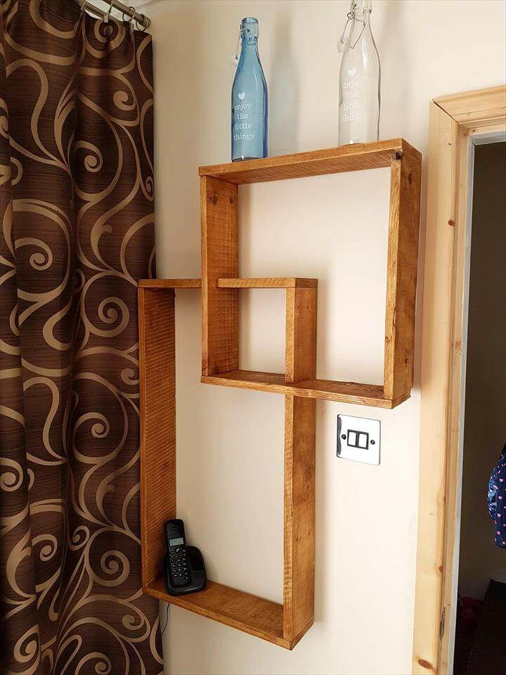 Pallet intermingling geometrical wall display shelves