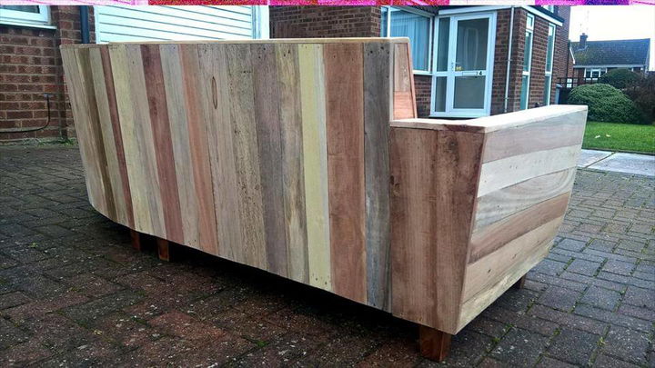 repurposed wooden pallet sofa with fancy curves